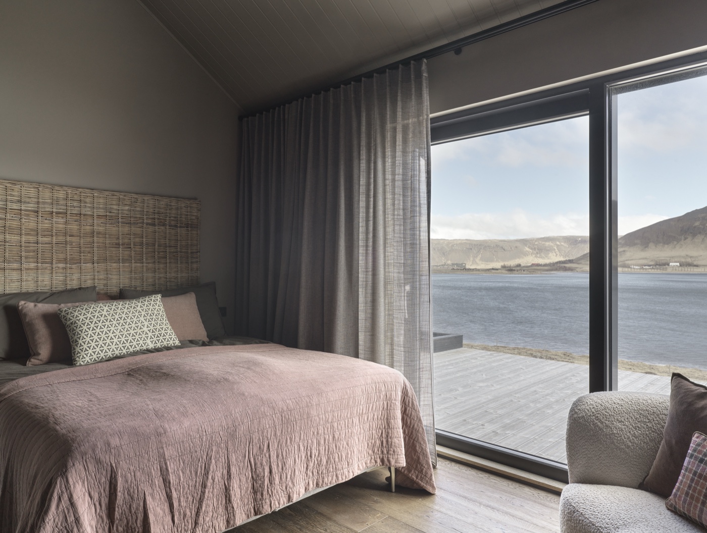 The Lake House — a bedroom overlooking the lake and mountains.